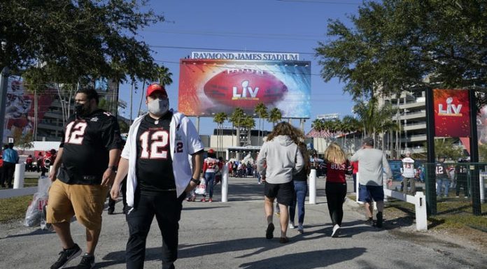 Baseball stadiums are filling up – but an analysis of the NFL’s 2020 season holds a warning about COVID-19 case spikes