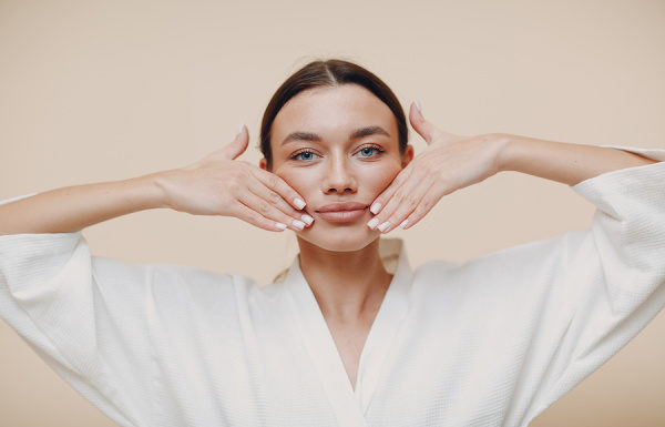 Face Yoga 101: 8 Facial Exercises for a Younger and Slimmer Face